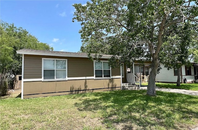 1005 Ronald Dr, Corpus Christi, TX 78412 - view of front of property featuring a front lawn