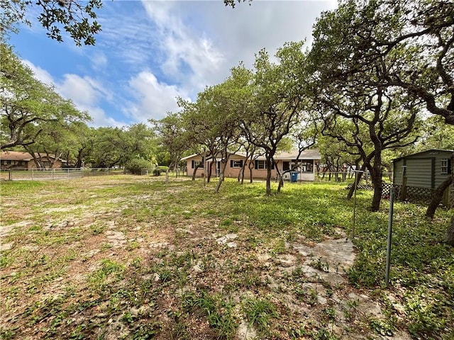 view of yard with fence