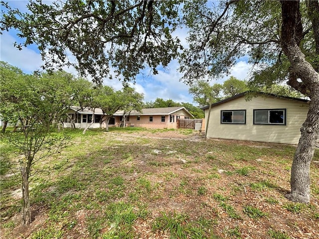 view of yard featuring fence