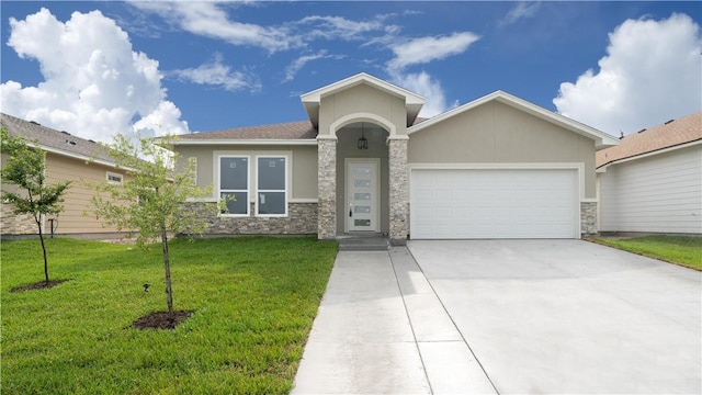 3634 Rebecca Dr, Corpus Christi, TX 78410 - view of front of home featuring stucco siding, an attached garage, driveway, a front lawn, and stone siding