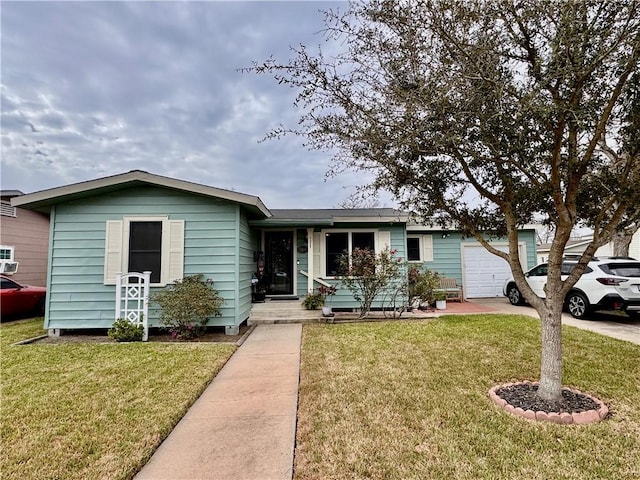 ranch-style house with an attached garage and a front yard