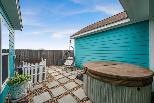 view of patio featuring a hot tub