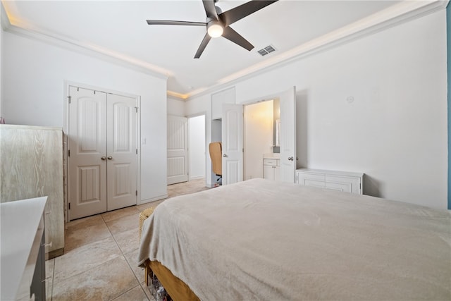 bedroom featuring ornamental molding, ceiling fan, and light tile patterned floors