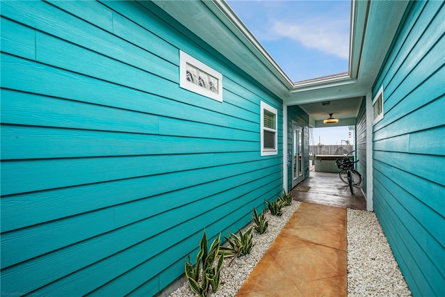 view of side of property featuring a patio area