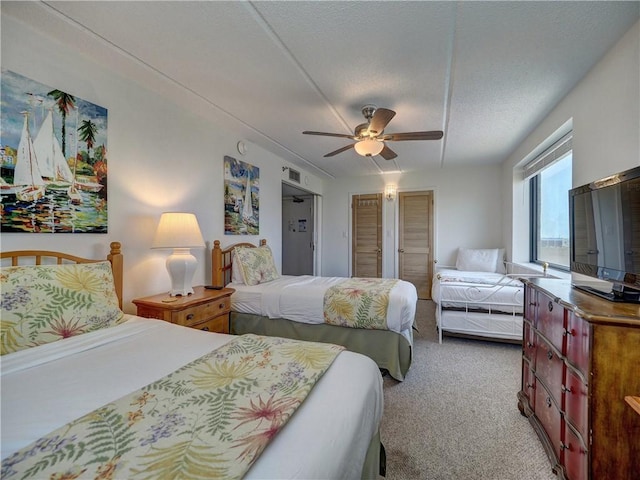 6109 State Highway 361 Unit 601, Port Aransas, TX 78373 - carpeted bedroom with ceiling fan