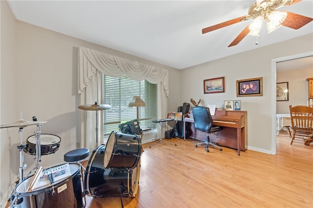 office featuring light wood-type flooring and ceiling fan