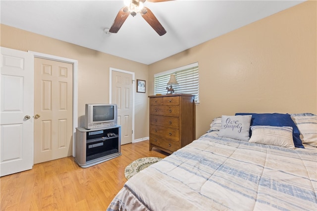 bedroom featuring ceiling fan and wood-type flooring