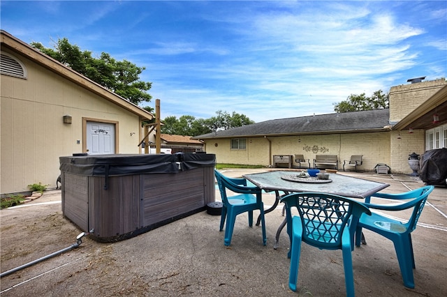 view of patio featuring a hot tub