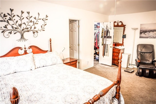 bedroom with a closet and carpet flooring