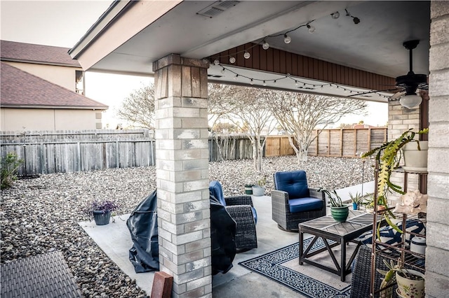 view of patio / terrace with ceiling fan and outdoor lounge area