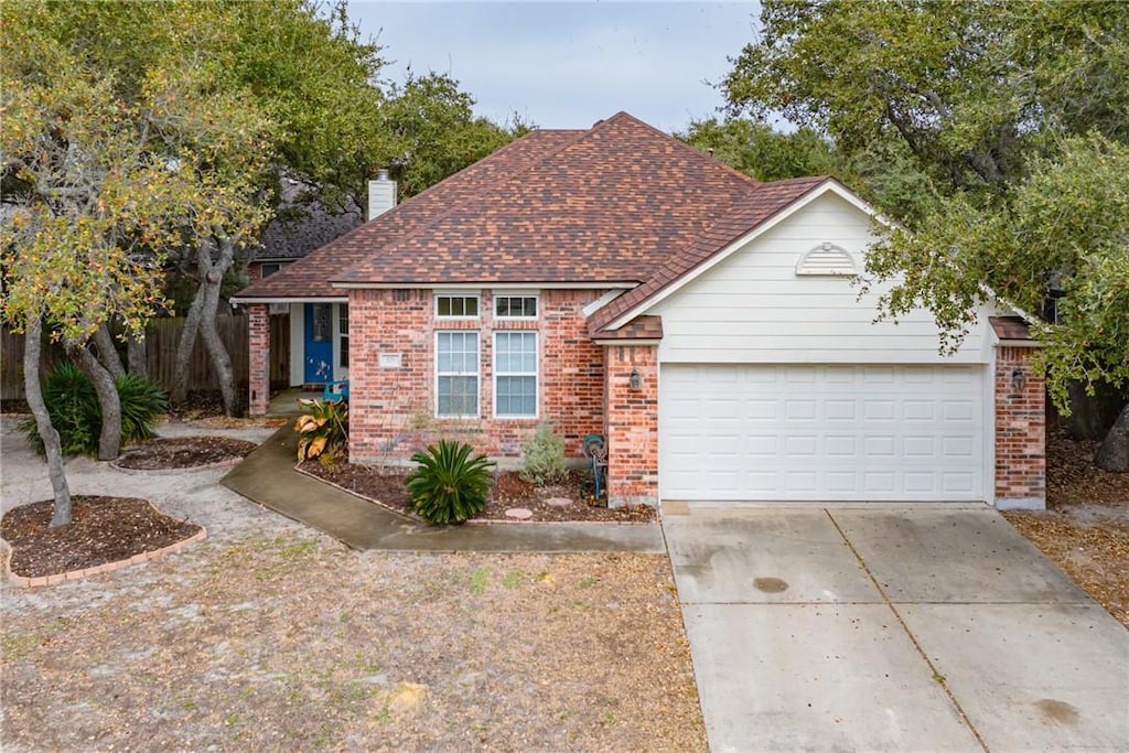 view of front of property with a garage