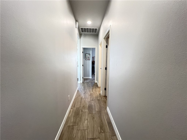 106 Webb St, Odem, TX 78370 - corridor featuring baseboards and dark wood-type flooring