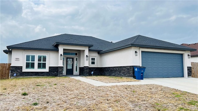 prairie-style home with a garage