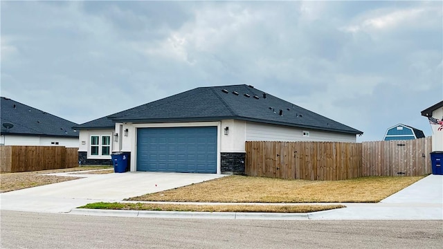 view of side of home with a garage