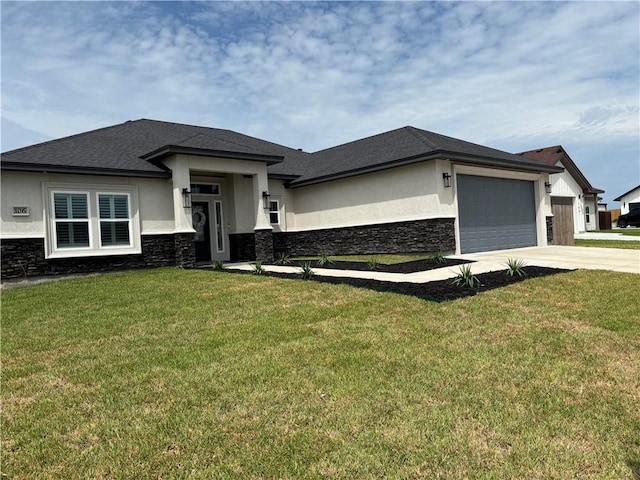 106 Webb St, Odem, TX 78370 - prairie-style house featuring stone siding, stucco siding, an attached garage, driveway, and a front lawn