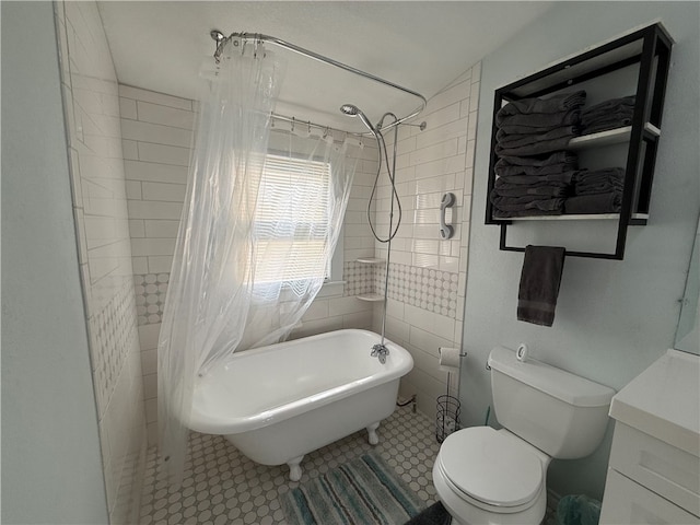 bathroom with tile patterned floors, separate shower and tub, tile walls, and toilet