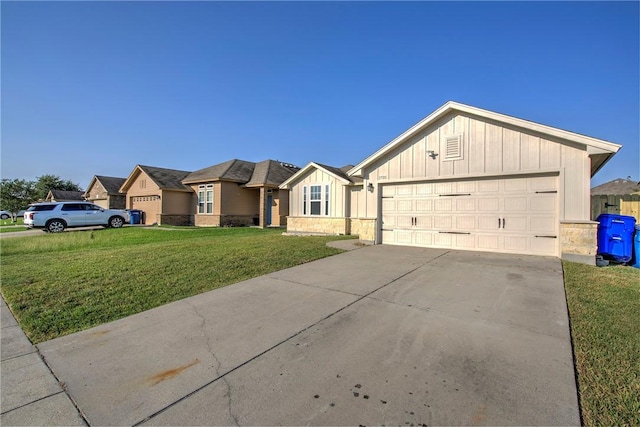 ranch-style house featuring a garage and a front yard