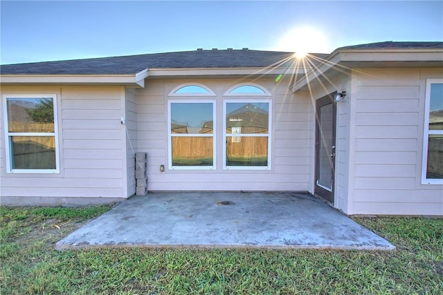 property entrance with a patio