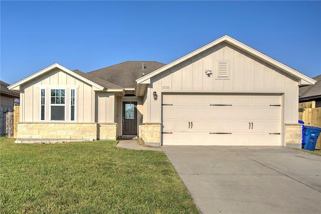 ranch-style house with a garage and a front yard