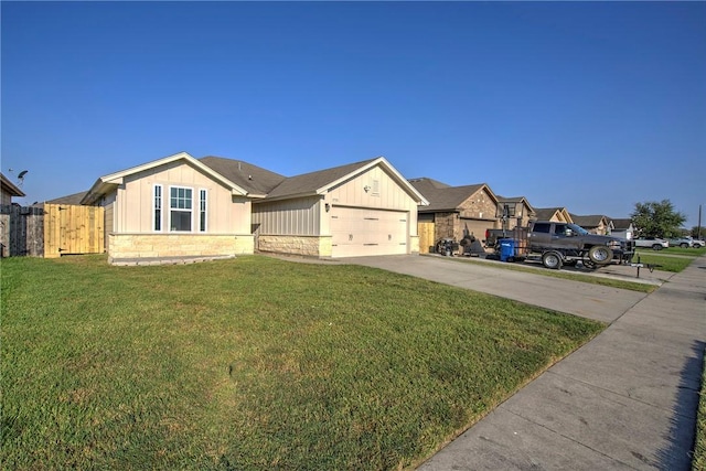 single story home featuring a garage and a front yard