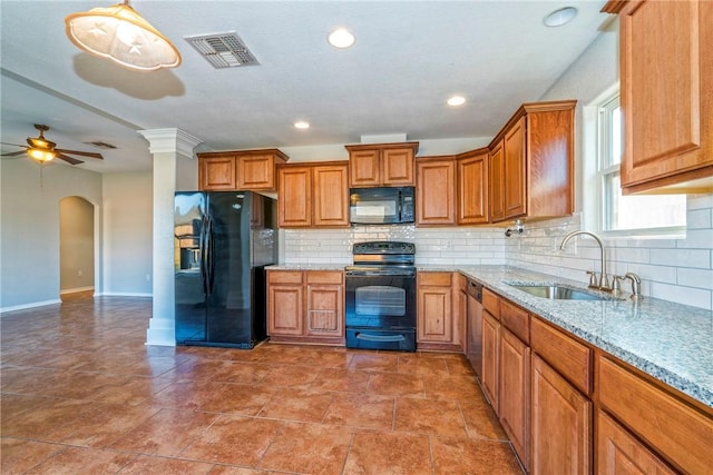 kitchen featuring sink, backsplash, black appliances, and ceiling fan