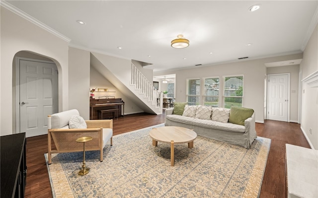 living room featuring ornamental molding, dark hardwood / wood-style floors, and ceiling fan