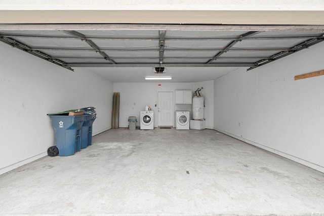 garage featuring a garage door opener and water heater