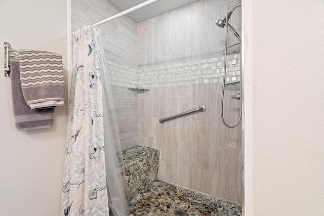 bathroom with curtained shower