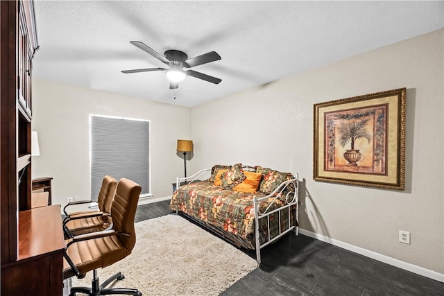 5213 Inverness Dr, Corpus Christi, TX 78413 - bedroom with dark wood-style floors, an office area, and a ceiling fan