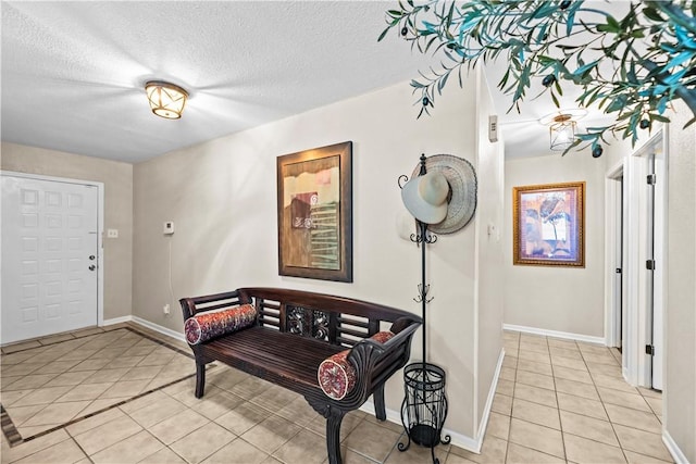 5213 Inverness Dr, Corpus Christi, TX 78413 - foyer entrance with light tile patterned floors and a textured ceiling