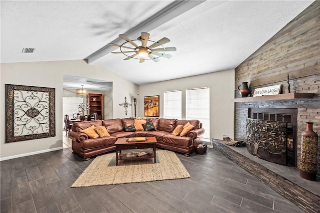 5213 Inverness Dr, Corpus Christi, TX 78413 - living room with a ceiling fan, wood finished floors, a fireplace, and a textured ceiling