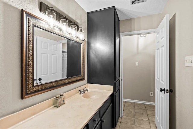 5213 Inverness Dr, Corpus Christi, TX 78413 - bathroom with vanity and tile patterned flooring
