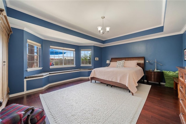 bedroom with crown molding, an inviting chandelier, a raised ceiling, baseboards, and wood finished floors