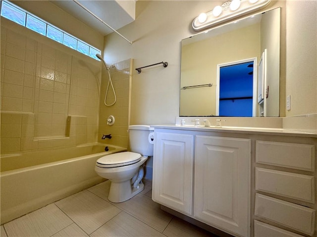 full bathroom featuring toilet, tile patterned flooring, tub / shower combination, and vanity