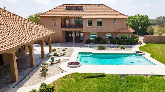 view of pool featuring fence, a fenced in pool, and a patio area
