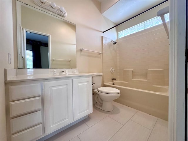 full bathroom with toilet, tile patterned floors, washtub / shower combination, and vanity