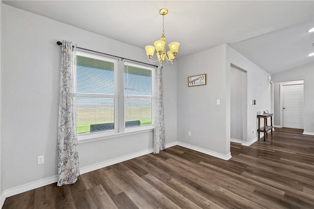 702 W 1st St, Bishop, TX 78343 - unfurnished dining area featuring a chandelier, wood finished floors, baseboards, and vaulted ceiling