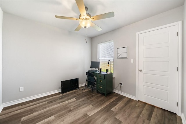 702 W 1st St, Bishop, TX 78343 - office space featuring wood finished floors, ceiling fan, and baseboards