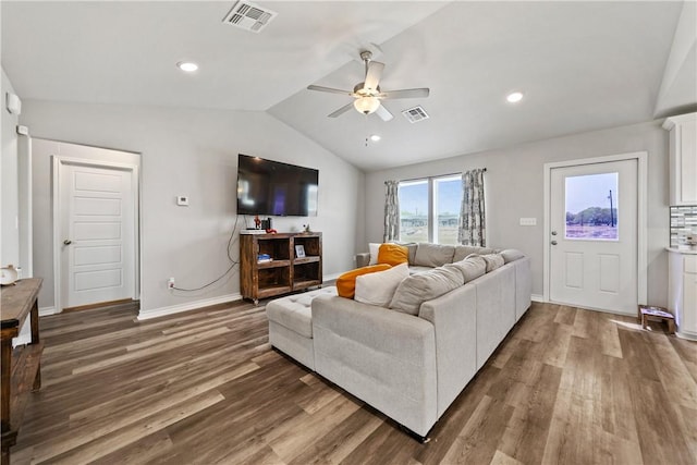 702 W 1st St, Bishop, TX 78343 - living room featuring wood finished floors, vaulted ceiling, a ceiling fan, and visible vents