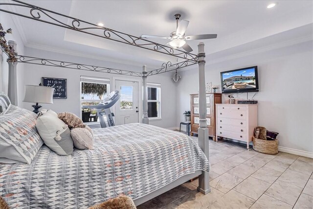 bedroom featuring a tray ceiling, recessed lighting, crown molding, baseboards, and access to exterior