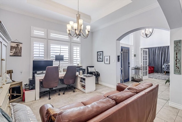 home office featuring arched walkways, a tray ceiling, an inviting chandelier, and ornamental molding