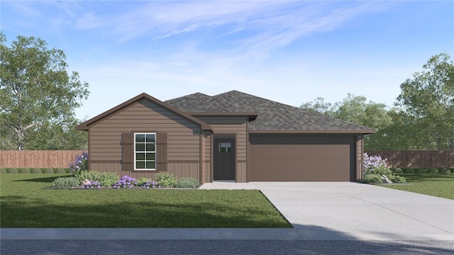 view of front facade featuring a garage and a front lawn