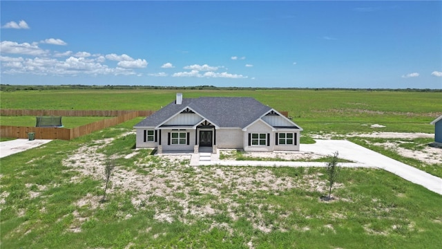 view of front of home featuring a rural view