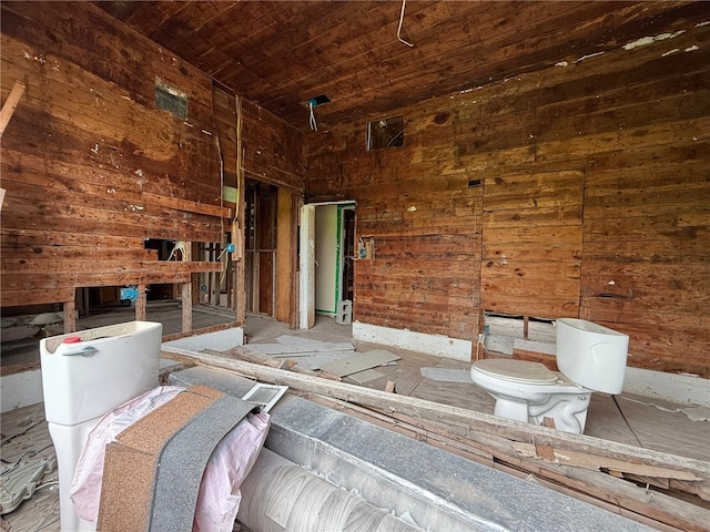 415 S Buchanan St, Beeville, TX 78102 - miscellaneous room featuring wood ceiling and wood walls