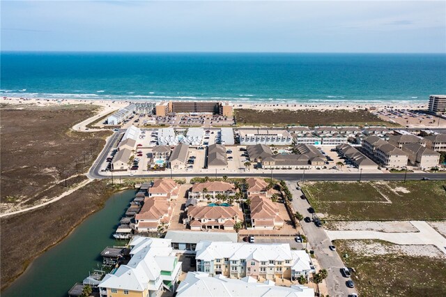 bird's eye view with a beach view and a water view