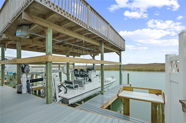 dock area featuring a water view