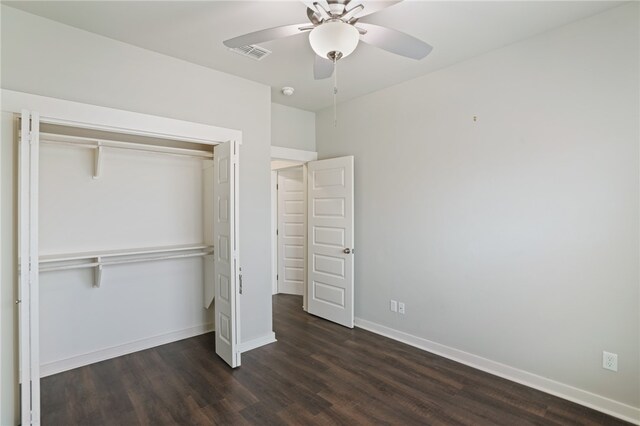 unfurnished bedroom featuring a closet, ceiling fan, and dark hardwood / wood-style floors