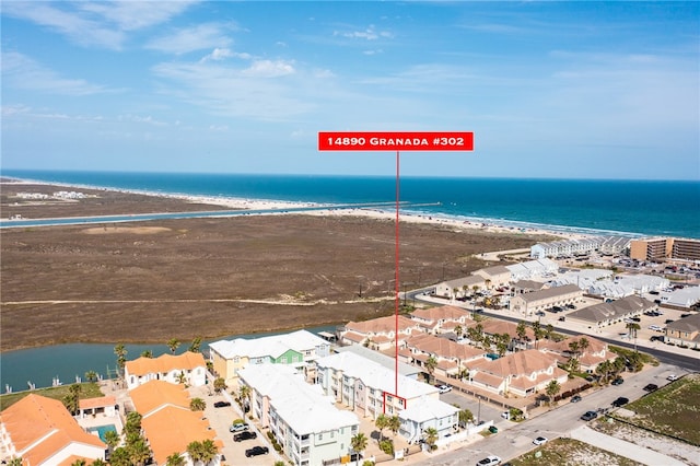 aerial view featuring a beach view and a water view