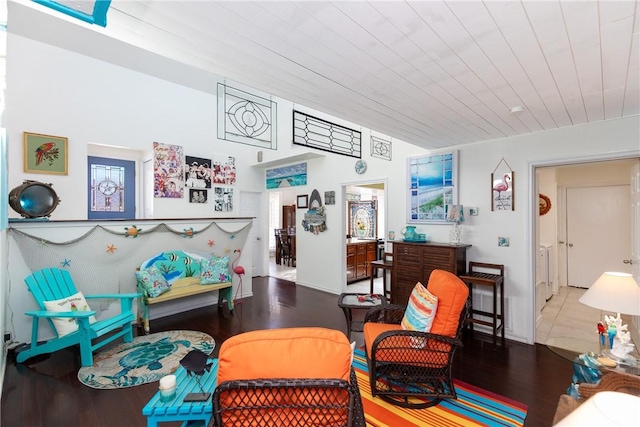 sitting room with wood finished floors and wooden ceiling