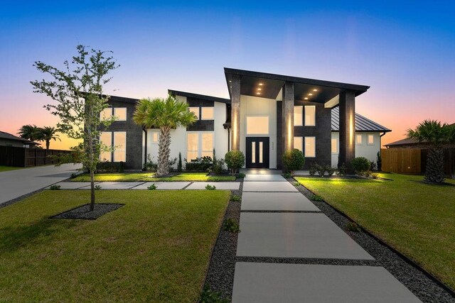 5402 Bonanza Dr, Corpus Christi, TX 78414 - contemporary home featuring french doors and stucco siding